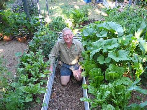 Alan Singleton showing off some water saving garden beds. 